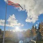 Family With Firepit At Sondre Fjellstolen Feriehus